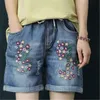 Kvinna hög midja denim shorts mode trend sommar lös broderad elastisk midja kort jean designer damer casual hål harlan jeans