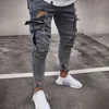 新しい男性デニムパンツリッピングホールジーンズファッションヒップホップスキニーペンシルジーンズ男性用ストレッチパッチワークポケットカーゴパンツ