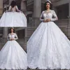 2019 Modest A Line Wedding Dresses Jewel Neck Appliques Lace Crystal Long Sleeves Sweep Train Sheer Back Plus Size Bridal gowns