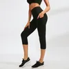 delle donne Capri Leggings morbidi pantaloni atletici pancia Performance Control collant a compressione ritagliata Yoga Pant con Pocket