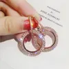 Nouveau design créatif boucles d'oreilles en peluche bijoux de haute qualité de mariage élégant en cristal rond et couleur argent pour femmes e001275o