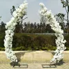 Decorazione di nozze romantica Porta ad arco in fiore di ciliegio Strada Piombo Archi a forma di luna Scaffale con set di fiori artificiali per forniture per fondali per feste