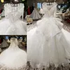 2019 Vestidos de novia de lujo más nuevos O-cuello Cristales de Swarovski Cuentas Sin espalda Una línea Lomg Tren Encaje Bling Vestidos de novia de princesa personalizados