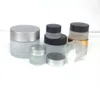 5g / 5ml 10g / 10mlの高級化粧品の貯蔵容器のjarの顔のクリームリップ香りの曇りのガラスびんの鍋、蓋とインナーパッドDhl