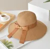 Opvouwbare vrouwen brede rand hoeden boog lint emmer hoed stro hoeden voor lady strand hoeden sunhat zomer Topee zon cap gratis verzending