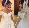 Underbara överskjorta bröllopsklänningar med löstagbara tågpärlor sjöjungfru brudklänningar spetsar dubai bröllopsklänning skräddarsydd