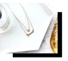 Mode- Collier en acier titane or rose 18 carats double lettres amour chaîne de clavicule personnalité collier de mode femme paragra court