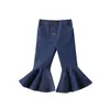 Nieuwe peuterbabymeisje Blauwe spijkerbroek Knoppen Skinny Flared Jeans Kids Rettery Denim Bellbottoms Lange broek Baby Casual Clothing6950348