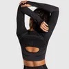 Completo sportivo da donna a maniche lunghe Set da yoga senza cuciture in 2 pezzi Abiti da palestra scavati Top corto per fitness Pantaloni leggings da allenamento a vita alta