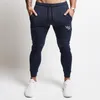 New Mens Joggers Pantaloni Casual Pantaloni Abbigliamento Abbigliamento Sportswear Bottoms Skinny Sweatpants Pantaloni Pannelli maschili Gyms Workout CrossFit Brand Pantaloni da pista