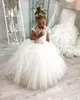 Lindos nuevos vestidos baratos para niñas de flores para bodas Cuello de ilusión Tul Fajas con cuentas de cristal Espalda abierta Cumpleaños Niña Comunión Vestidos de desfile