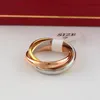 Anillo de tres anillos de joyería de diseño de lujo para hombres y mujeres, anillos de estilo Simple a la moda con anillos de oro rosa de tres colores