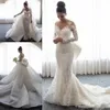 2021 Luxus-Meerjungfrau-Hochzeitskleider, transparenter Ausschnitt, formelle Brautkleider, lange Ärmel, Illusion, volle Spitzenapplikationen, Tüll-Überröcke mit abnehmbarer Schleppe, Übergröße