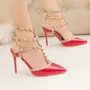 New out Roman fashion sandals Fine high-heeled bright spikesWestern style nightclub fine heels lacquer leather metal