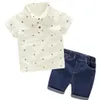 Set di vestiti estivi per bambini a basso prezzo 2019 Abbigliamento per bambini Camicia a maniche corte per bambini + pantaloni Completo per bambini 2 pezzi di vestiti, fiori