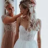 Modest A Line Beach Wedding Dresses Spaghetti Sleeveless Beads Appliques Tulle Wedding Dresses Sweep Train Boho Bridal Gowns