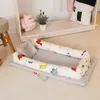 ベッドのためのポータブルベビーバシネットラウンガー新生児ベビーベッド通気性と枕付きの眠り巣