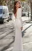 Elegant satin sjöjungfru bröllopsklänningar Långärmade Sheer Side Split Vestidos de Novia 2020 Backless Bridal Bröllopsklänningar Billiga