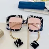 Sunglasses Designer Unique Black fre red lens woman earring sunglasses classic fashion 0722S glasses polycarbonate plate square 0722 e box RI33