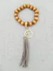 Cross-border hand-beaded wooden bead elastic rope bracelet keychain accessories tassel pendant