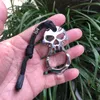 Ny Mini Iron Skull Självförsvar Keychain Skull Punch Single Finger Keychain Bil Nödfönster Breaker Easy Escape Keychain