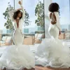 섹시한 오픈 백 머메이드 웨딩 드레스 터키 2022 계층 계층 레이스 프릴 딥 브이 넥 긴 소매 신부 가운 아프리카 푹신한 피쉬 테일 신부 드레스 플러스 사이즈