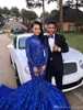 2021 Luxus schöne königsblaue Meerjungfrau-Abschlussballkleider Hofzug Blumen Applikationen Pailletten elegante formelle Abend-Party-Kleider nach Maß