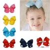 30 pcs/lot 4 pouces solide cheveux arc avec pince filles gros-grain ruban cheveux arcs Boutique à la main épingle à cheveux pour enfants cheveux accessoires