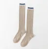 Femmes coton longues chaussettes mode filles hiver automne rayé genou chaussettes en tricot Style japonais Anime habiller bas bonneterie