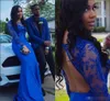 Royal Blue Prom Dresses Sexy Backless Mermaid Lace Applique Gereed Sheer Neck Long Sleeves South African Evening Party Jurk