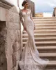 2022 Vestidos de novia de sirena de encaje de manga larga con cuello transparente con falda desmontable Apliques de tul Vestidos de novia de tren de barrido robes de mariee