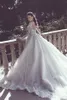 2020 Nova Mermaid Sheer vestidos de renda do casamento com trem destacável Neck mangas compridas frisada Overskirt Dubai Árabe vestidos de noiva