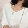 sell 75cm white 89mm natural freshwater pearl glass beads bowknot clasp necklace long sweater chain fashion jewelry6691374