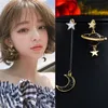 Version coréenne des nouvelles étoiles Moon Sangle Boucles d'oreilles Femme Femme Spot de bijoux de boucle d'oreille asymétrique Feme