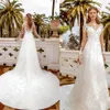 Abiti da sposa bohémien A-Line Maniche lunghe trasparenti Collo trasparente Appliques di pizzo Perline Abiti da sposa Corte dei treni Abito da sposa Vestidos