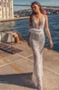 Dimitrius Dalia 2019 sjöjungfru bröllopsklänningar med fjädrar V Neck Lace Bridal Gowns Vestito da Sposa Backless Beach Bröllopsklänning Anpassning