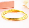 Partihandel Top Guld Varumärke Smycken Tunna 2mm Pulseira Armband Bangle Dubai Gold Wire Bangle Armband för Kvinnor Flickor 3st / Lot