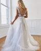 Incrível A linha da praia vestidos de casamento Backless V profundo pescoço Appliqued Boho vestidos de noiva Andar de comprimento Tulle Bohemian Vestidos De Noiva