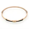 Wholesaleluxury fashion brand 18K rose gold Drops glue Card buckle bracelet Titanium steel simple women charm couple love bracelet wholesale