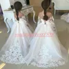 Prinsessan Långärmad Lace Flower Girls Dresses 2019 A-Line Billiga Girls Party Formell Kappor First Communion Dresses Kids Tutu Födelsedagbröllop