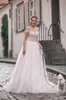 Scoop Tiul Dekolt SPLICE FEEDING Koronkowe aplikacje Krótkie rękawy A-line sukienka ślubna Zamiatanie pociągu koronki w górę sukienki ślubne vestidos de novia