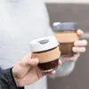 Anpassad Transparent Cork Sleeve Travel Reusable Håll Glas Kaffekopp med Silikonlock