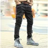 Männer Herbst solide Zipper lässig gewaschene Jeans Männer Jeans schwarz hochwertige Mode Multi-Taschen-Hosen Männer Marke Design