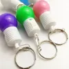 Led light flashing new year christmas bulb key fob creative toy small gift pendant novelty jewelry wholesale