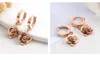 Mode-Luxus-Designer-Ohrringe aus Roségold und Titan mit elegantem Camillia-Blume-Anhänger, Kreis-Ohrclips für Damen
