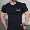 Camisa rápida do ginásio seco do esporte camiseta Homens fitness apertados manga curta correndo camisa dos homens Bodybuilding Tops T-shirt Rashgard