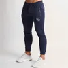 Новые Мужские Joggers Повседневная Брюки Фитнес Спортивная одежда Дне туна Скинни Друщеные Двухселистые Брюки Мужские Тренажеры Тренировки CrossFit Brand Track Брюки