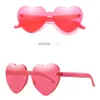 Hjärtform Kvinnor Solglasögon One Pieces Rimless Girls Sun Glasögon Candy Färglinser Stor Frame 11 Färger Partihandel Glasögon