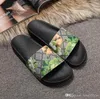 Strand slippers mannen Klassieke Platte Zomer Slides Lazy Designer Cartoon Big Head flops lederen heren Hotel Bad Brief vrouwen schoenen Dame sexy Sandalen Grote maat 35-39-42-45