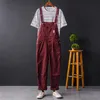2019 Nowy Hip Hop Streetwear Spodnie Bib Ogólne Jean Moda Mężczyźni Jean Kombinezony Zgrywanie Dżinsów Bib Dla Mężczyzn Zgrywanie Denim Kombinezon